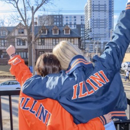 two friends in college jackets